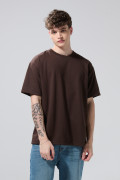 Camiseta unicolor manga corta oversize en tela gruesa