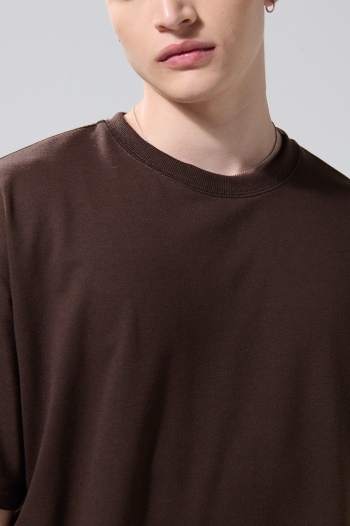 Camiseta unicolor manga corta oversize en tela gruesa