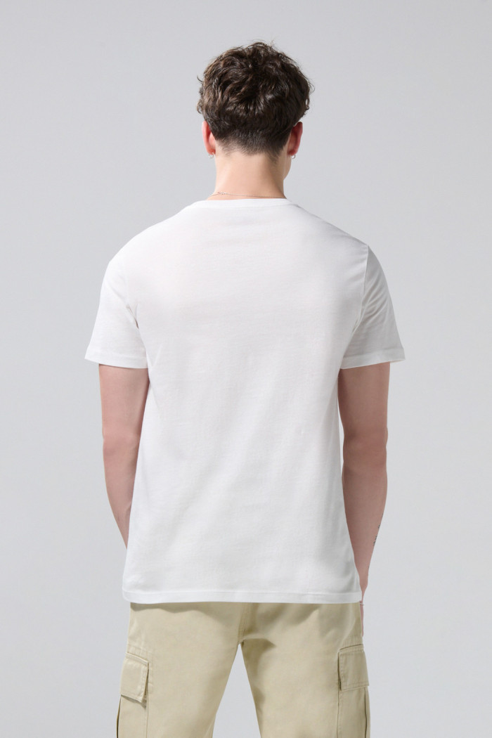 Camiseta crema de Snoopy manga corta con bolsillo
