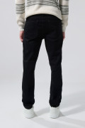 Jean negro skinny tiro bajo con bolsillos y ajuste ceñido