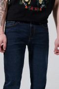 Jean tiro bajo azul oscuro slim con cremallera y bolsillos