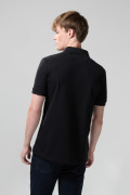 Camiseta unicolor tipo polo con manga corta y botones