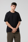 Camiseta oversize unicolor en algodón cuello redondo