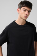 Camiseta oversize unicolor en algodón cuello redondo