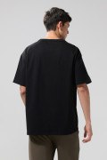 Camiseta oversize unicolor en algodón cuello redondo