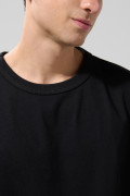 Camiseta oversize unicolor en algodón cuello redondo