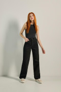 Jean tiro alto 90´S negro con bota ancha y bolsillos