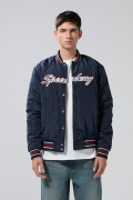 Chaqueta bomber college azul intensa con rectilíneos