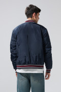 Chaqueta bomber college azul intensa con rectilíneos