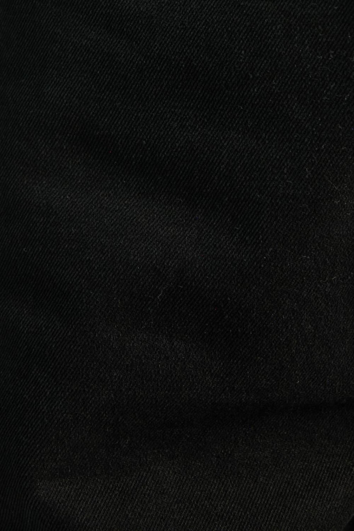 Jean tiro alto 90´S negro con bota ancha y bolsillos