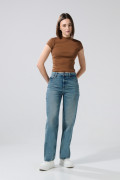 Jean azul medio 90´S tiro alto con desgastes y bota recta