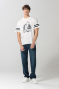Camiseta crema cuello redondo oversize con arte de Pluto
