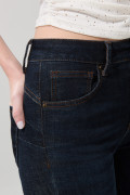 Jean azul intenso jegging con costuras cafés y tiro alto